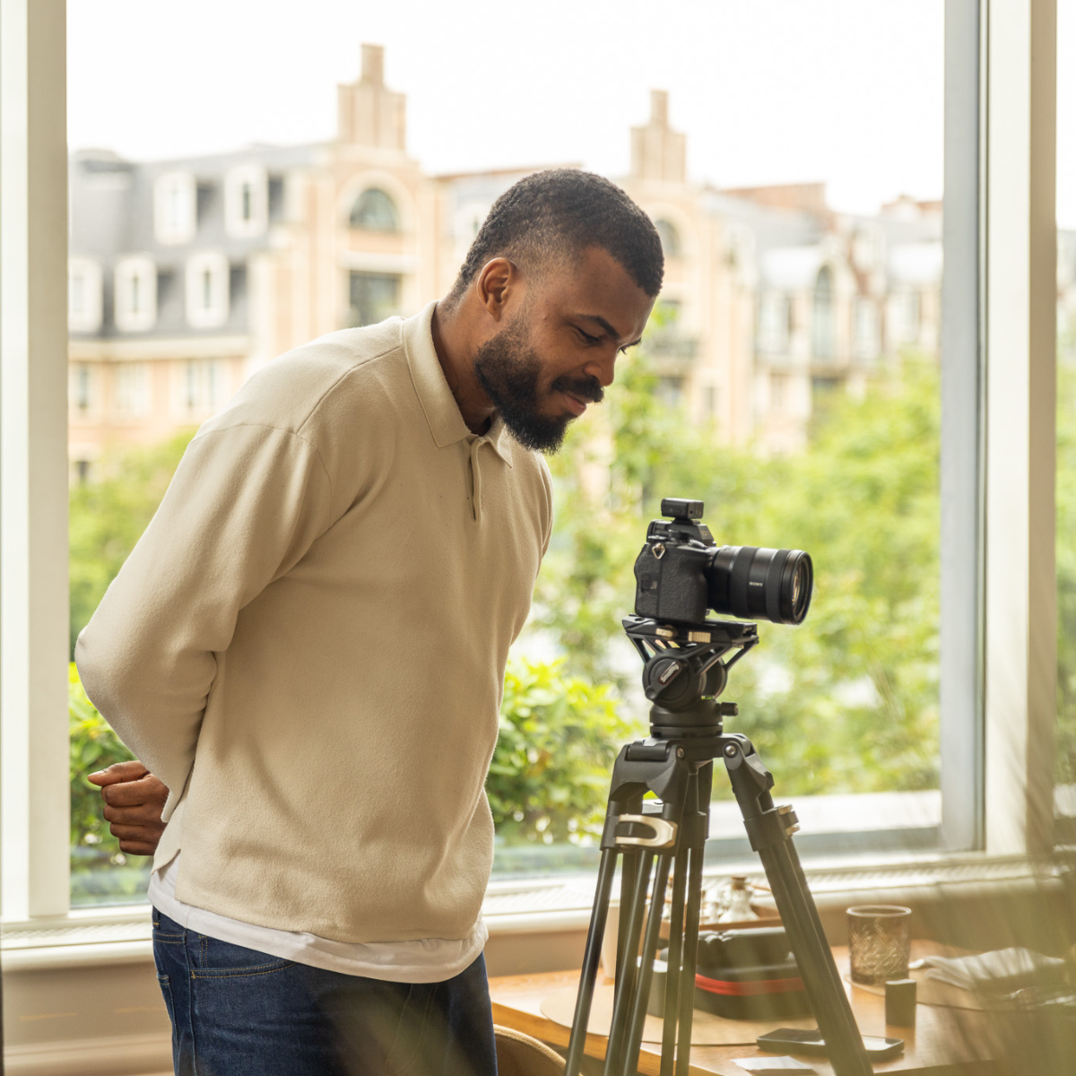 A Hautel team member preparing a camera during a hotel production